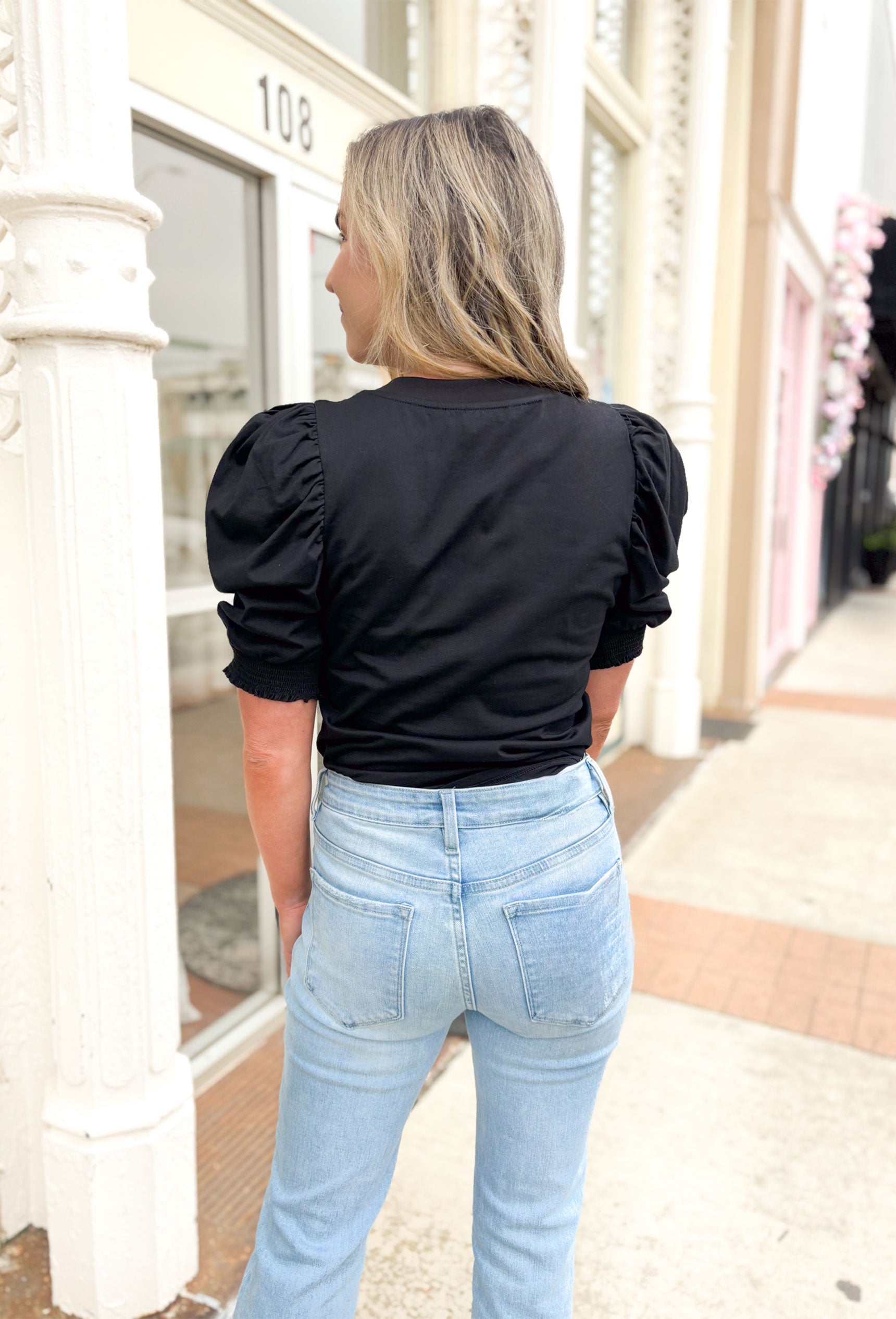 Lost Trust Top in Black, black puff sleeve top with cinching on the hem and slight v-neck