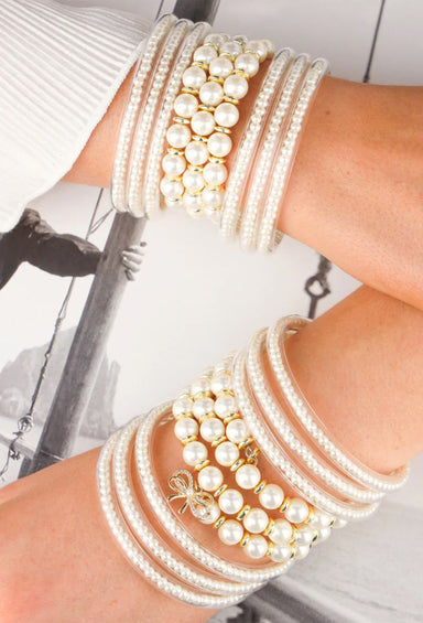 BUDHAGIRL Three Queens Bangles in Pearl, set of three pearl bracelets with gold, rose gold, and silver caps