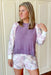 Z SUPPLY Cammie Quilt Long Sleeve, soft knit pajama top with purple torso and quilted patterned sleeves with colors white, heather gray, egg plant, purple, and burnt orange