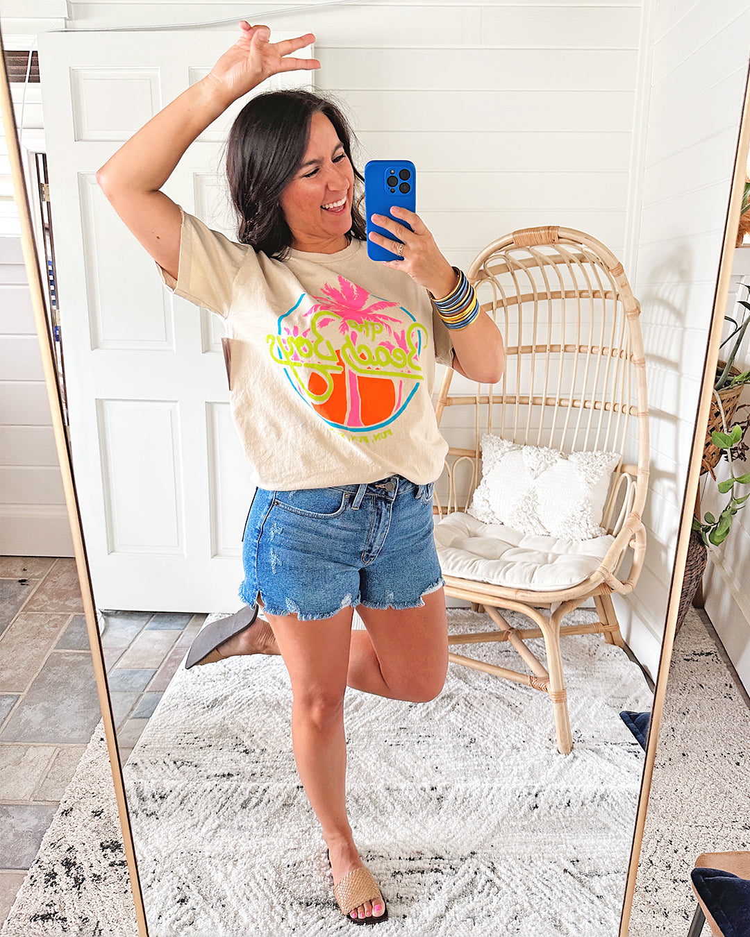 Neon Beach Boys Graphic Tee, Neutral tee with a bold and bright neon design that reads "The Beach Boys" and a classic palm tree motif