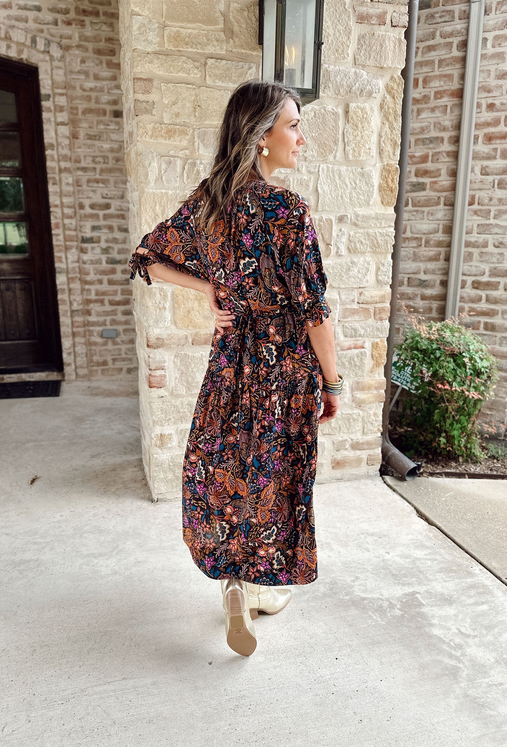 Begin Again Floral Midi Dress, black midi dress with floral and leaf print in orange, teal, cream, and orchid
