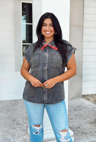 Good For You Top, short sleeve black washed denim top with two front pockets, hidden buttons, collar, and rolled sleeves 