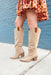 Archer Taupe Boot, taupe faux suede and features a sleek, knee-high design
