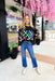 Checkmate Sequin Pullover, black crewneck with neon pink, blue, green, orange and yellow sequin checkered print across the chest and lower half of the sleeves g