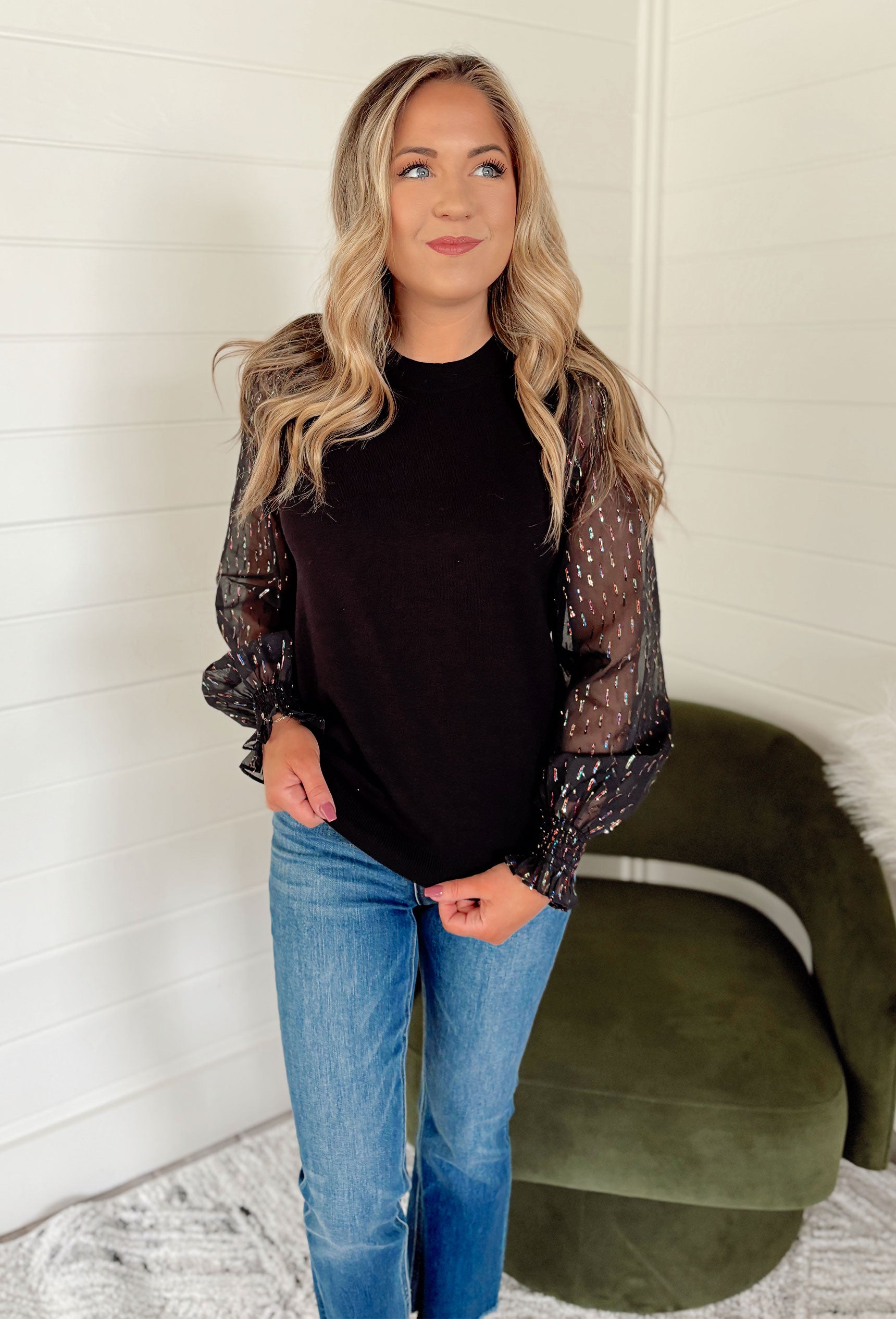 Don't Dull Your Sparkle Top, black ribbed top with sheer sleeves that have rainbow tinsel detailing