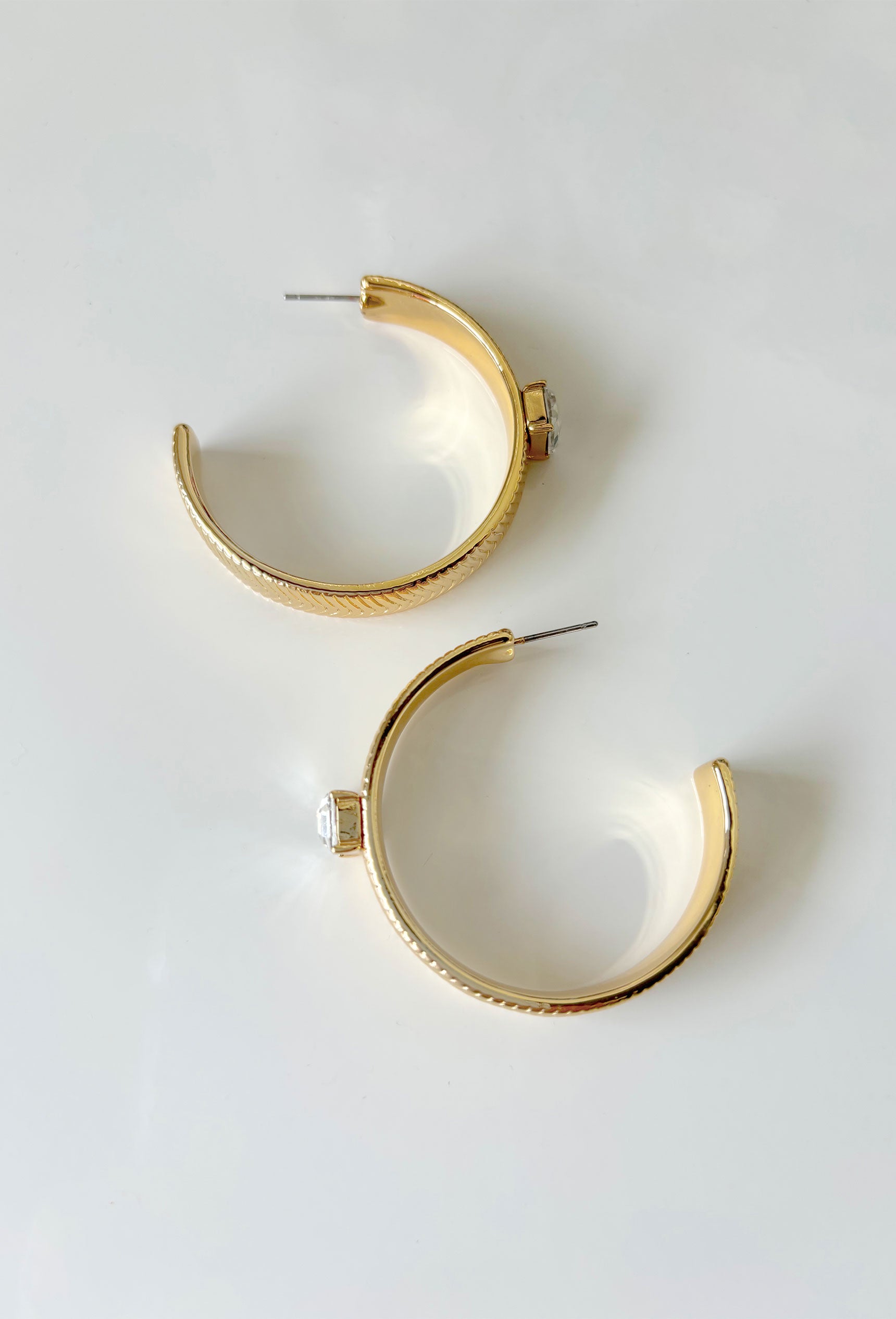 Fall For You Hoop Earrings, wide gold textured hoop with one rhinestone in the center