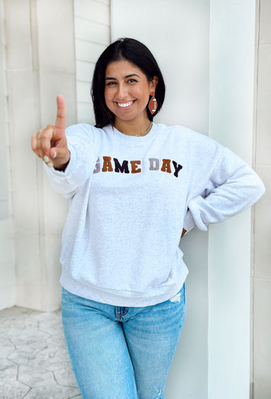 Z SUPPLY Oversized Game Day Sweatshirt, light grey crewneck with letter patches spelling 'game day'