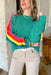 Leave Your Worries Sweater, kelly green sweater with neon pink, orange, and yellow stripes down the arms 