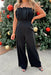 Meet Me At The Plaza Jumpsuit, black strapless jumpsuit with wide pleating on the chest, pockets, and wide legs