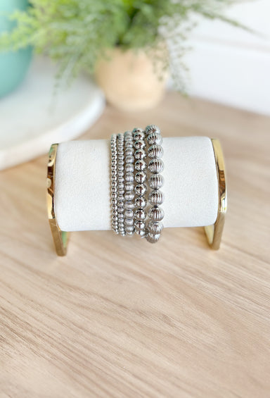 More Like You Bracelet Set, stack of 5 textured silver beaded bracelets varying in sizes 