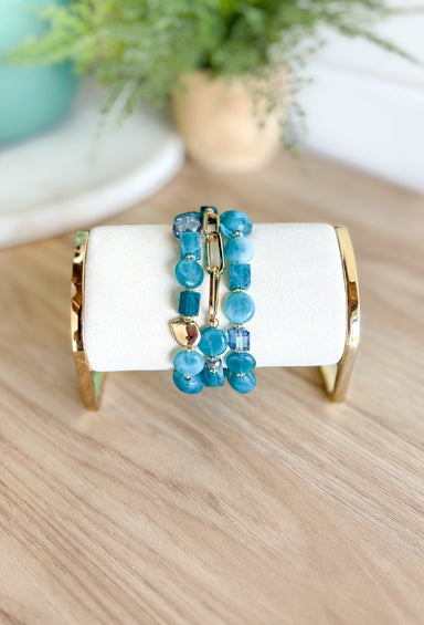 Never Forget Bracelet Set, stack of three marine colored stone bracelets with gold chain detail and beading
