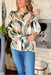 Say What You Want Blouse, abstract long sleeve blouse with sage green, tan, cream and black. Sleeves are cinched with a ruffle on the edge