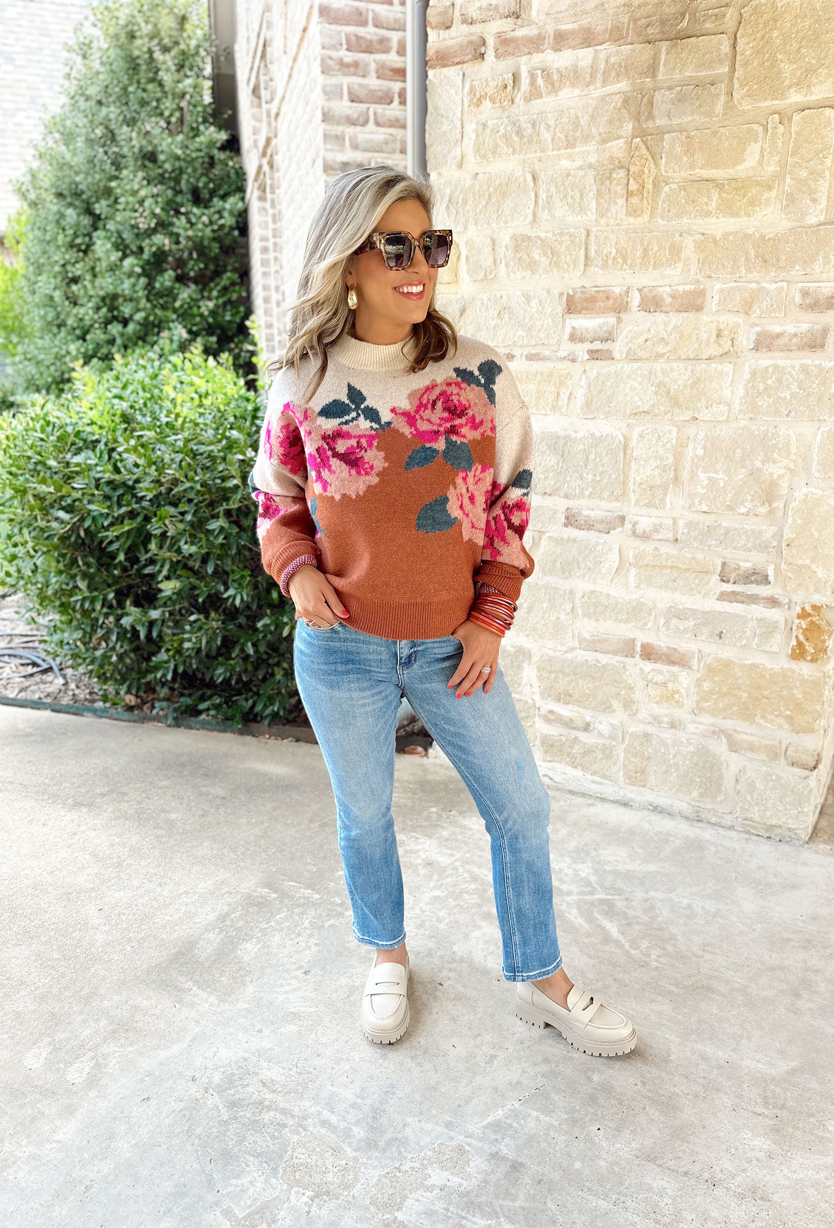 Smell The Flowers Sweater, burnt orange and cream sweater with pink and mauve flowers and green leaves