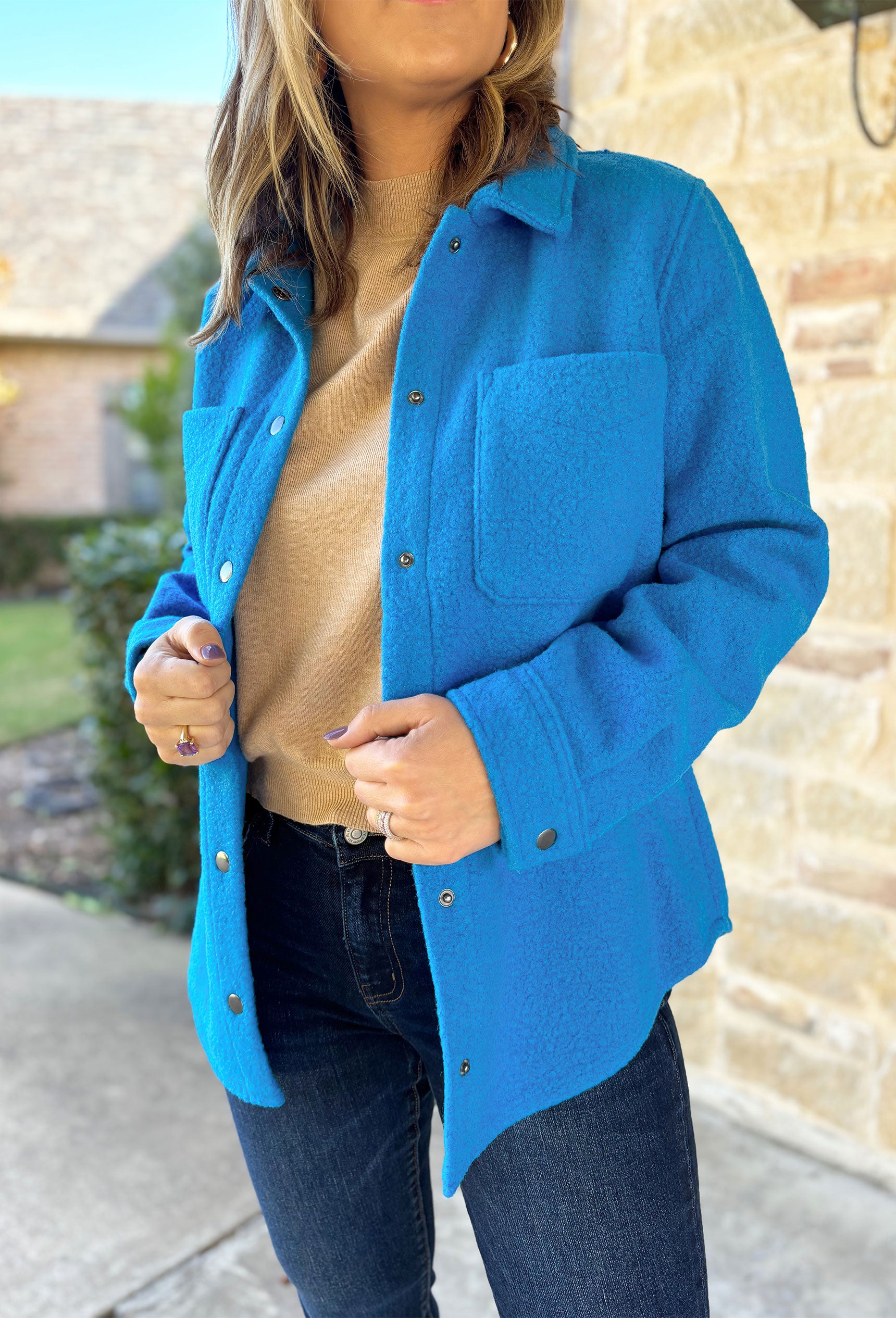 Snow Angel Jacket, electric blue wool blend coat with snap buttons and two front pockets on the chest