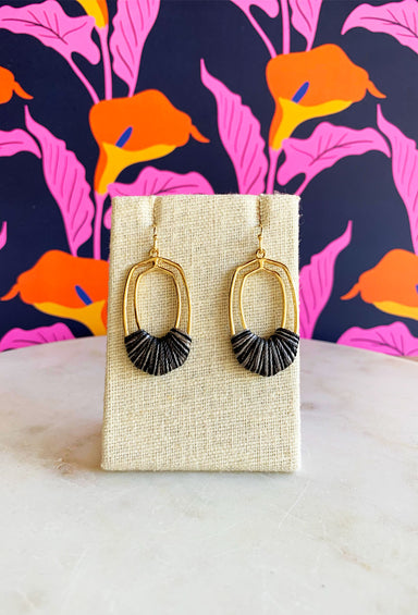 Stolen Kiss Earrings in Black, gold dangle earrings with black thread wrapped around the bottom 