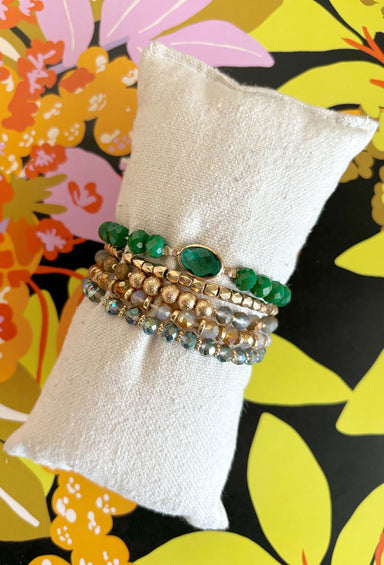 Time For Change Bracelet Set, green and gold beaded bracelet set with one bracelet having a green gem 