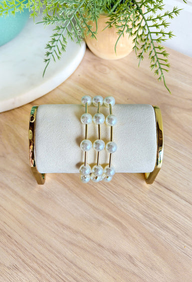 Uptown Chic Bracelet Set in Gold, stack of three gold and white pearl bracelets