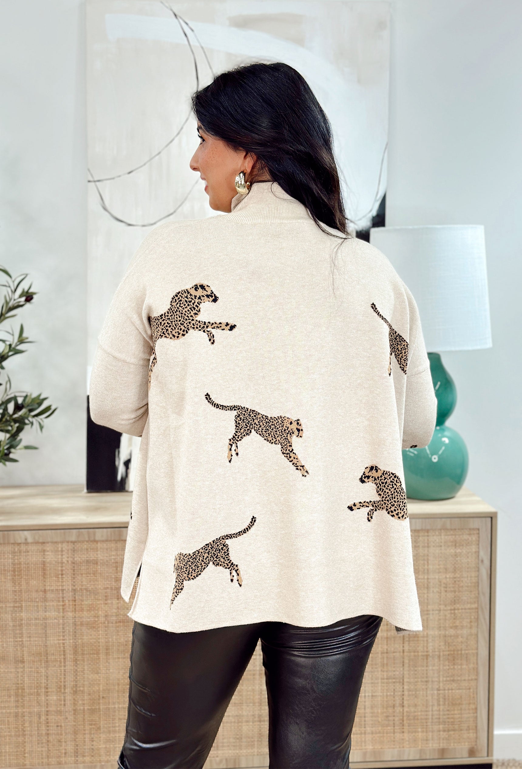 Wild Idea Sweater in Oatmeal, oatmeal sweater with leopards scattered on sweater, exaggerated slit on side