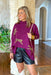 Wild Idea Sweater in Plum, plum magenta sweater with leopards scattered on sweater, exaggerated slit on side