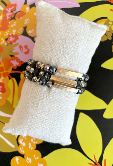 Your Only Chance Bracelet Set, metallic black bead, matte black bead, and silver beaded bracelet with gold detailing 