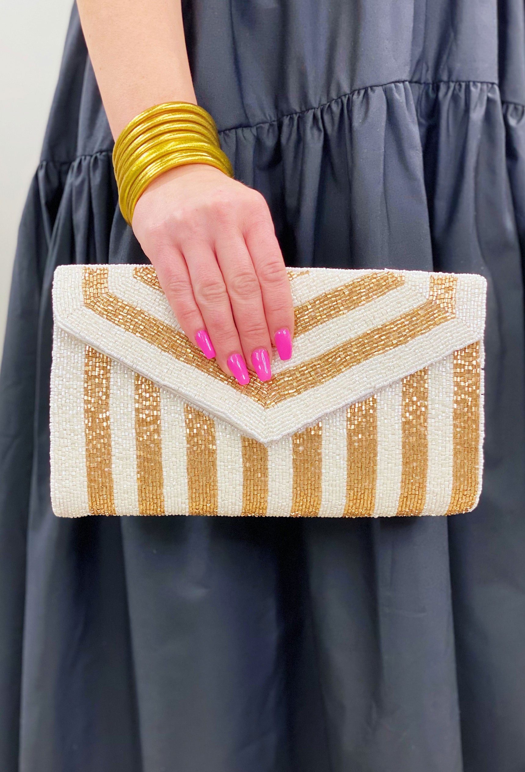 A Night Out Beaded Clutch in White, white and gold striped beaded clutch