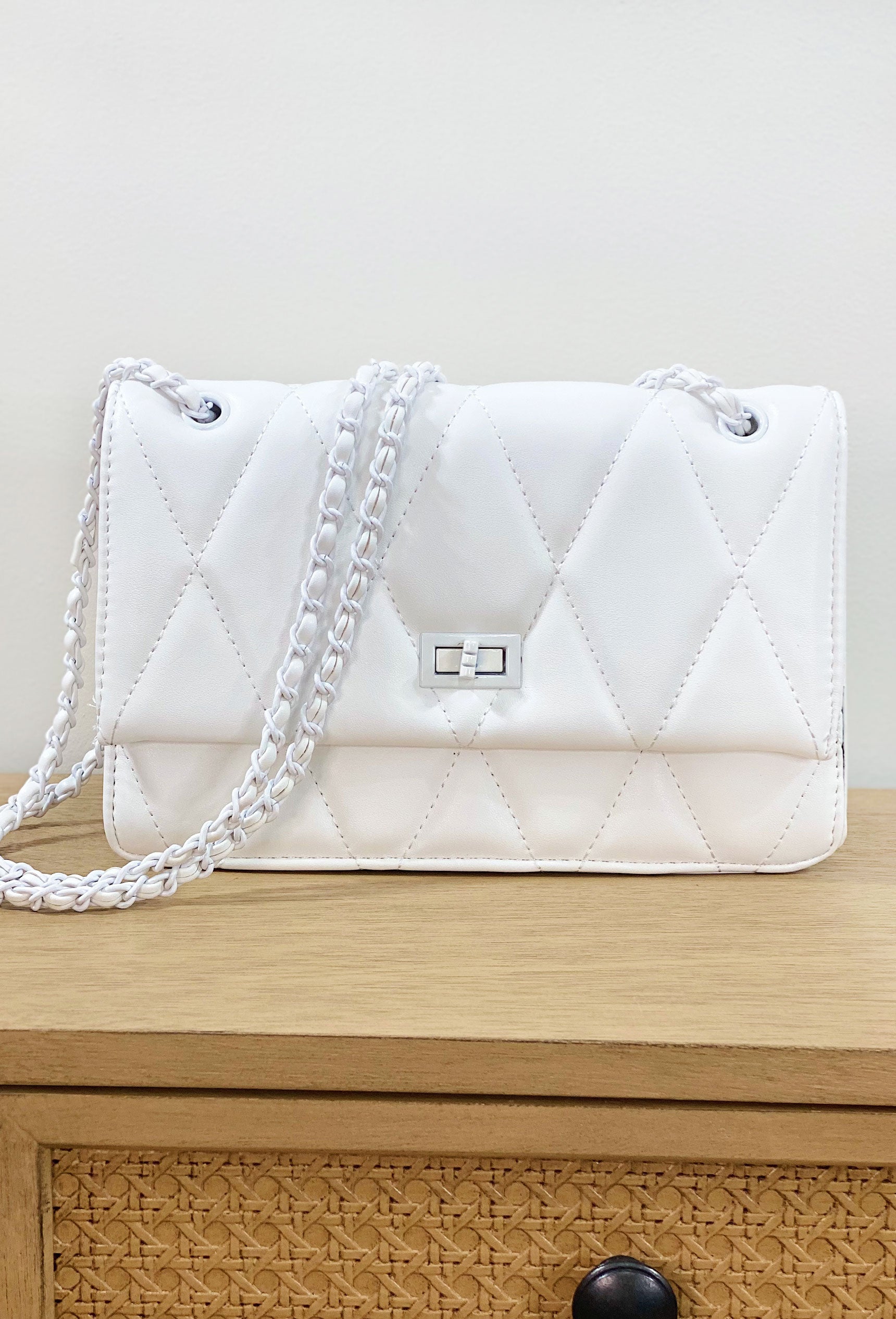 All Eyes On Her Purse, white quilted purse with clasp closure, white chain straps