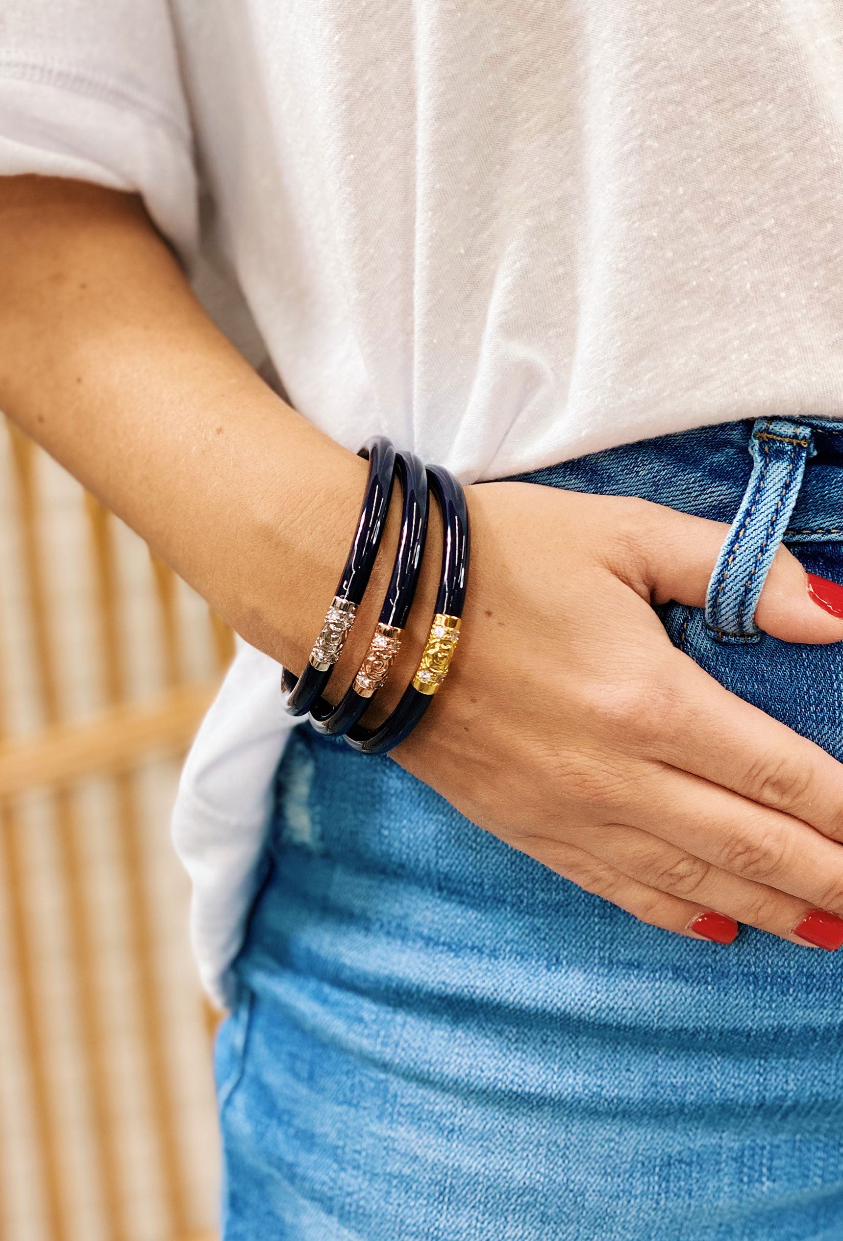 BUDHAGIRL Three Kings All Weather Bangles in Navy, Three navy bangles, one with gold detail, one with silver detailing, and one with copper detailing 