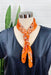 Charlee Bandana Neck Scarf in Orange, orange colored bandana, with white and black design