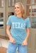 Cool Tones Texas Jersey Tee, two toned, blue Texas tee, with "Texas" written on front in a lighter blue