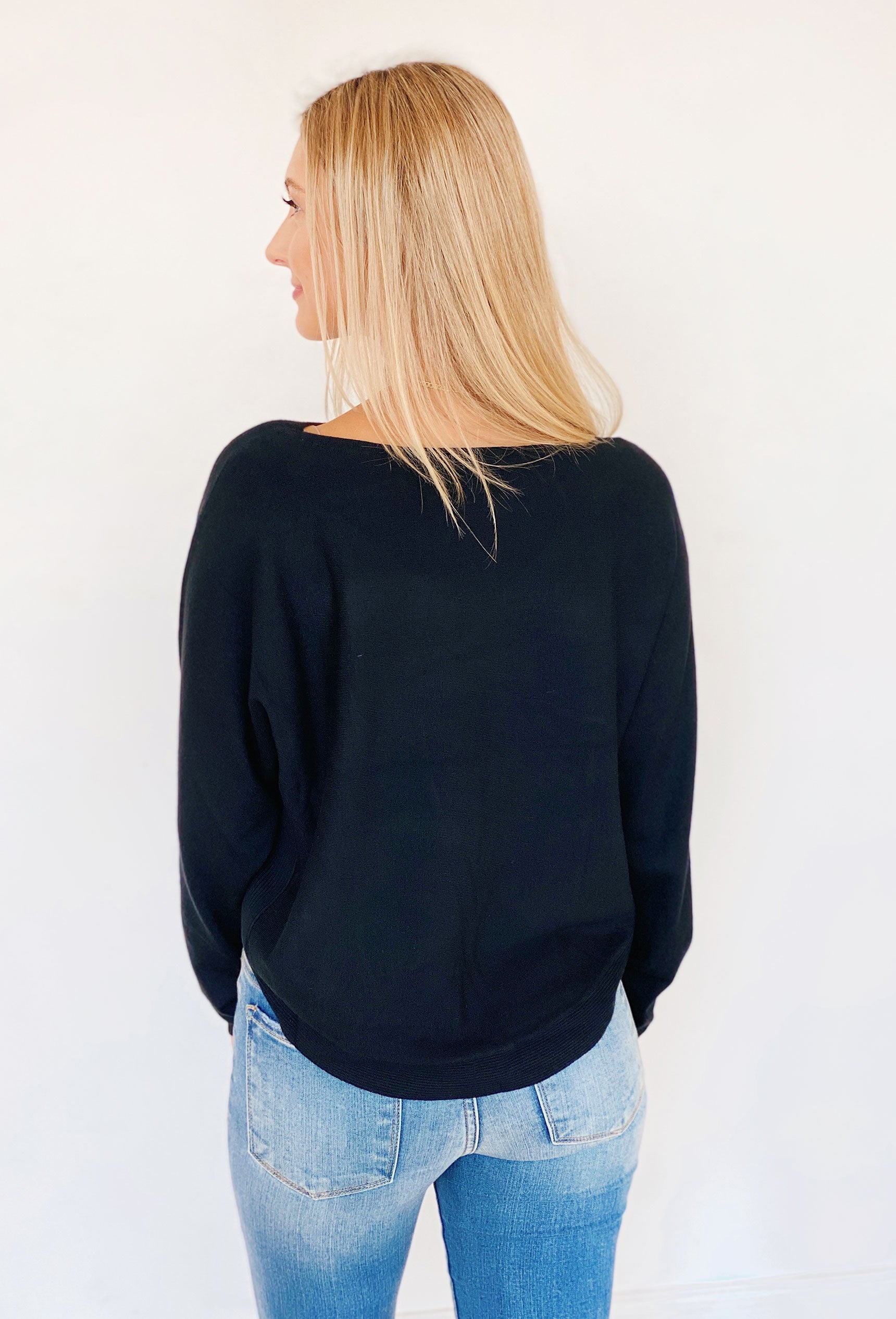 Sara Sweater by Dreamers in Black, cropped style, scalloped hem 