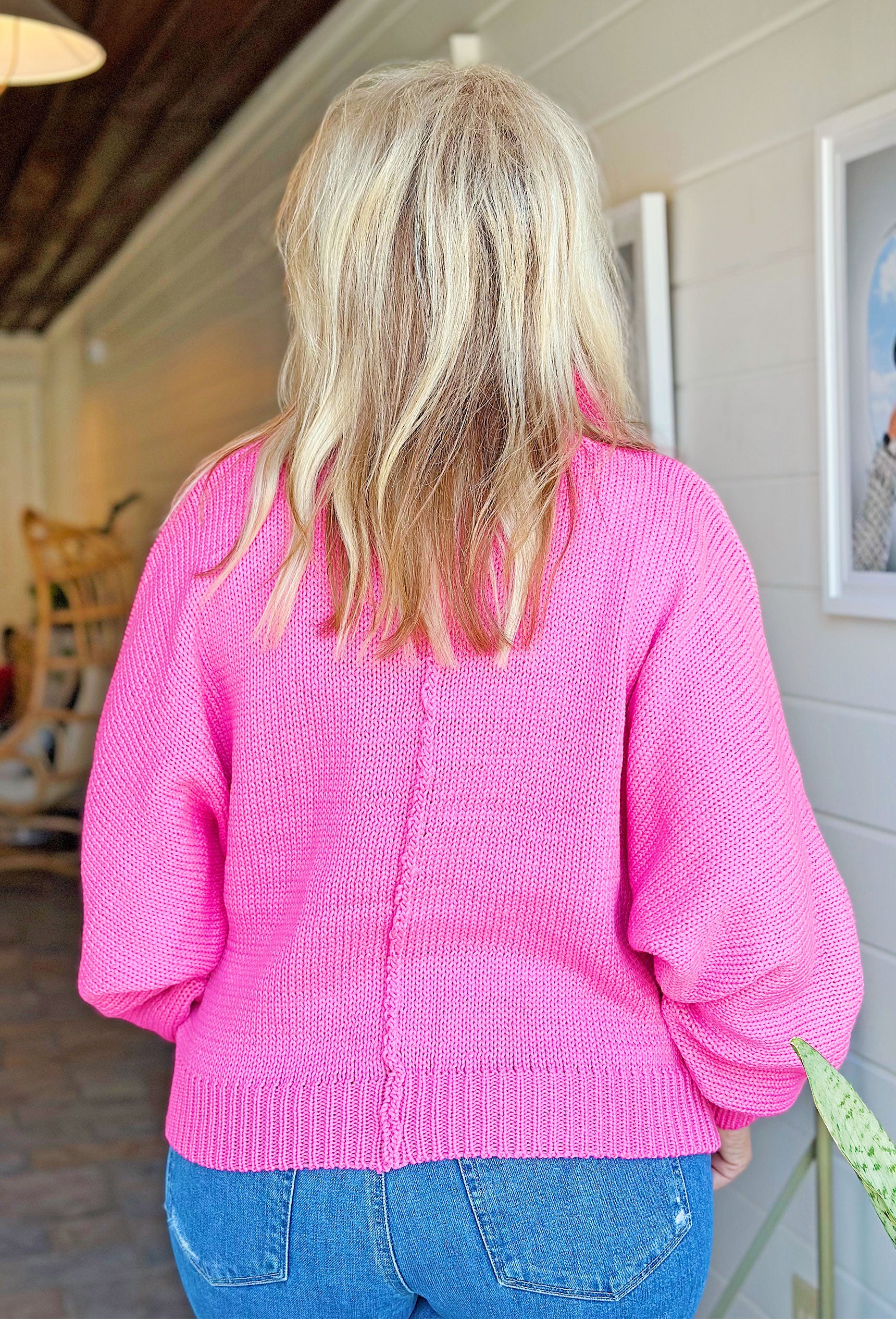 Feeling Sparks Pearl Sweater in Pink, pink knitted sweater, pearl button up, exposed seam 