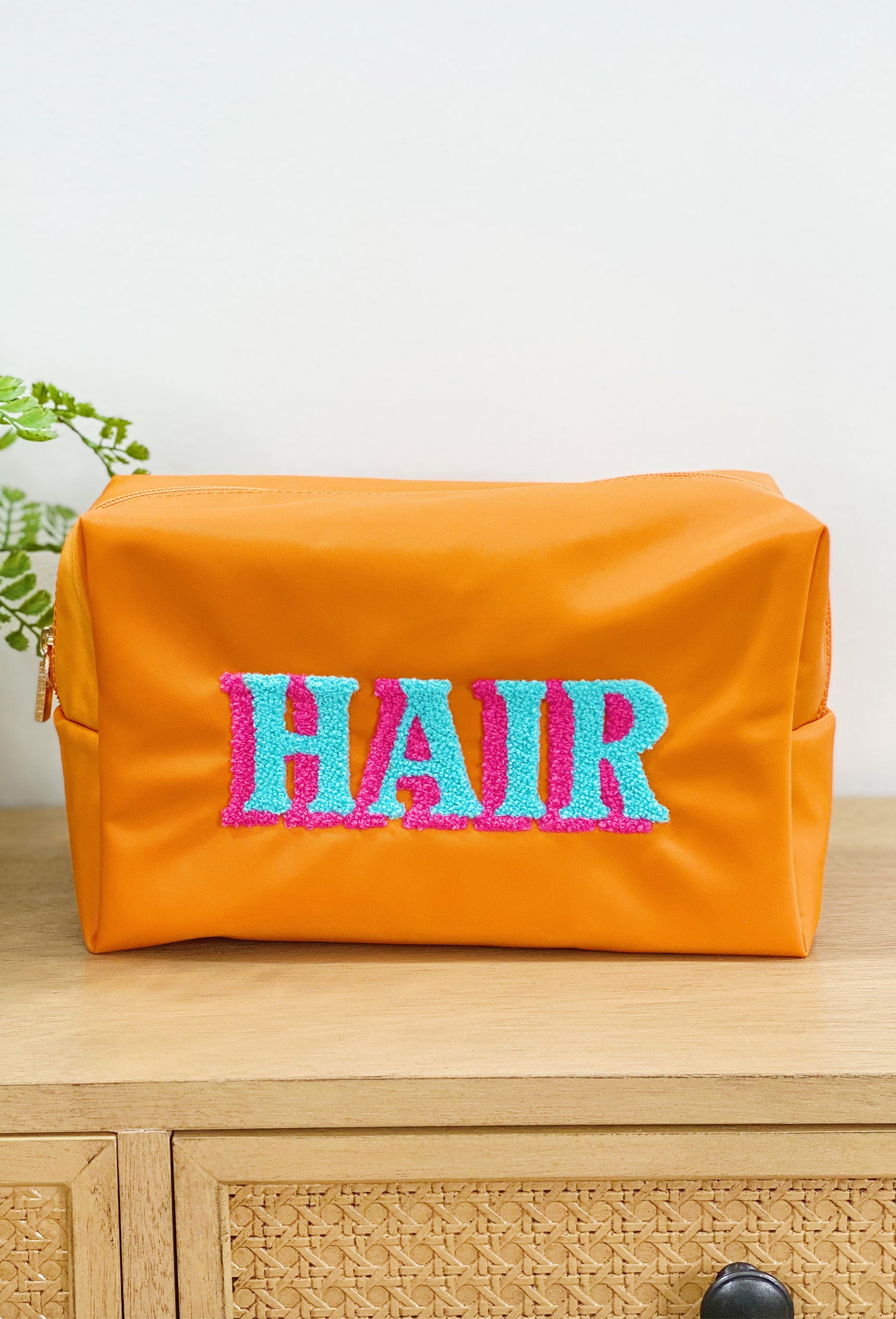 Hair Nylon Cosmetic Bag, orange nylon cosmetic bag with blue and pink "hair"patch
