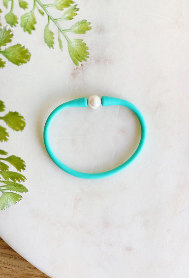 Hidden Treasure Bracelet in Turquoise, rubber bracelet with pearl detail