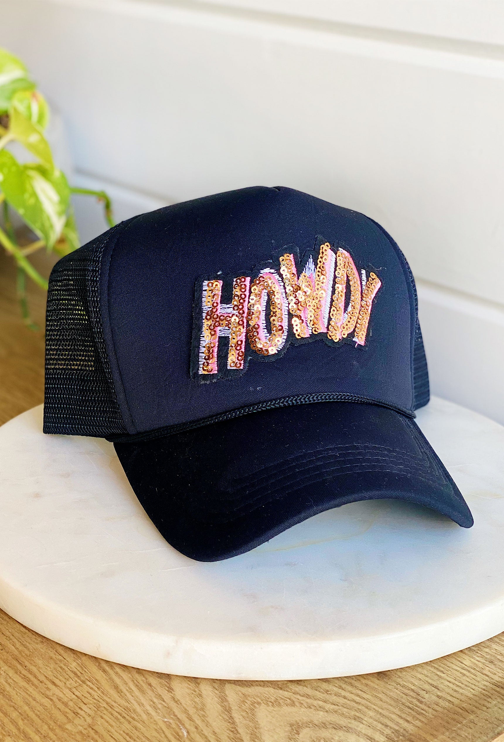 Howdy Sequin Trucker Hat, black trucker hat, howdy written across front in sequins and pink shadowed