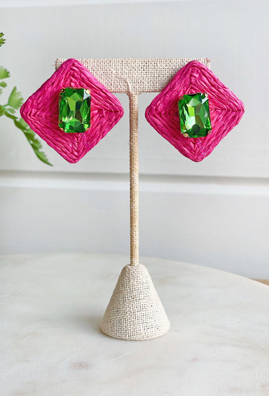 Mainstream Drama Earrings in Pink, diamond shaped wrapped raffia earrings with a large Green rhinestone detail in the center