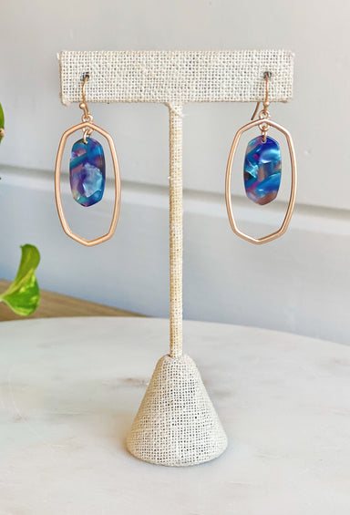 Make Your Move Earrings, hollow geometric shape with blue gemstone having in middle