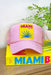Miami Beach Trucker Hat, light pink trucker hat with yellow Miami Beach patch on the front