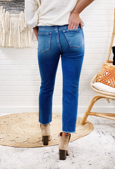 Mid Rise Straight Crop Jeans by Vervet, stretch denim with a cropped length, distressing along the right knee, slim straight fit, raw edge hem