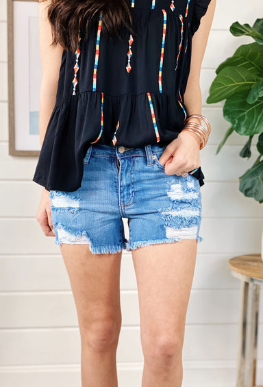 Mid Rise Super Distressed Shorts, distressed front denim shorts with frayed back 