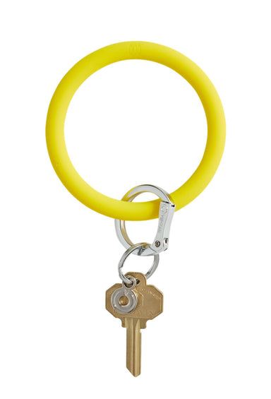 O-Venture Silicone Key Ring in Yes Yellow, yellow circular key ring that can be worn around your wrist 