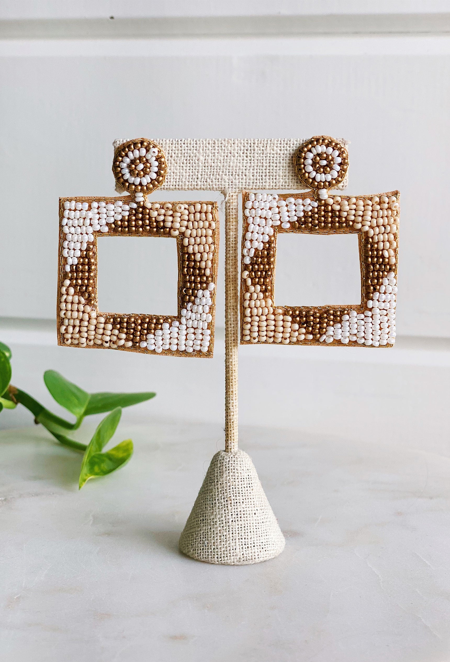 On My Mind Beaded Earrings, square shaped earrings with square hole in the middle, neutral colored beads, felt and post backing
