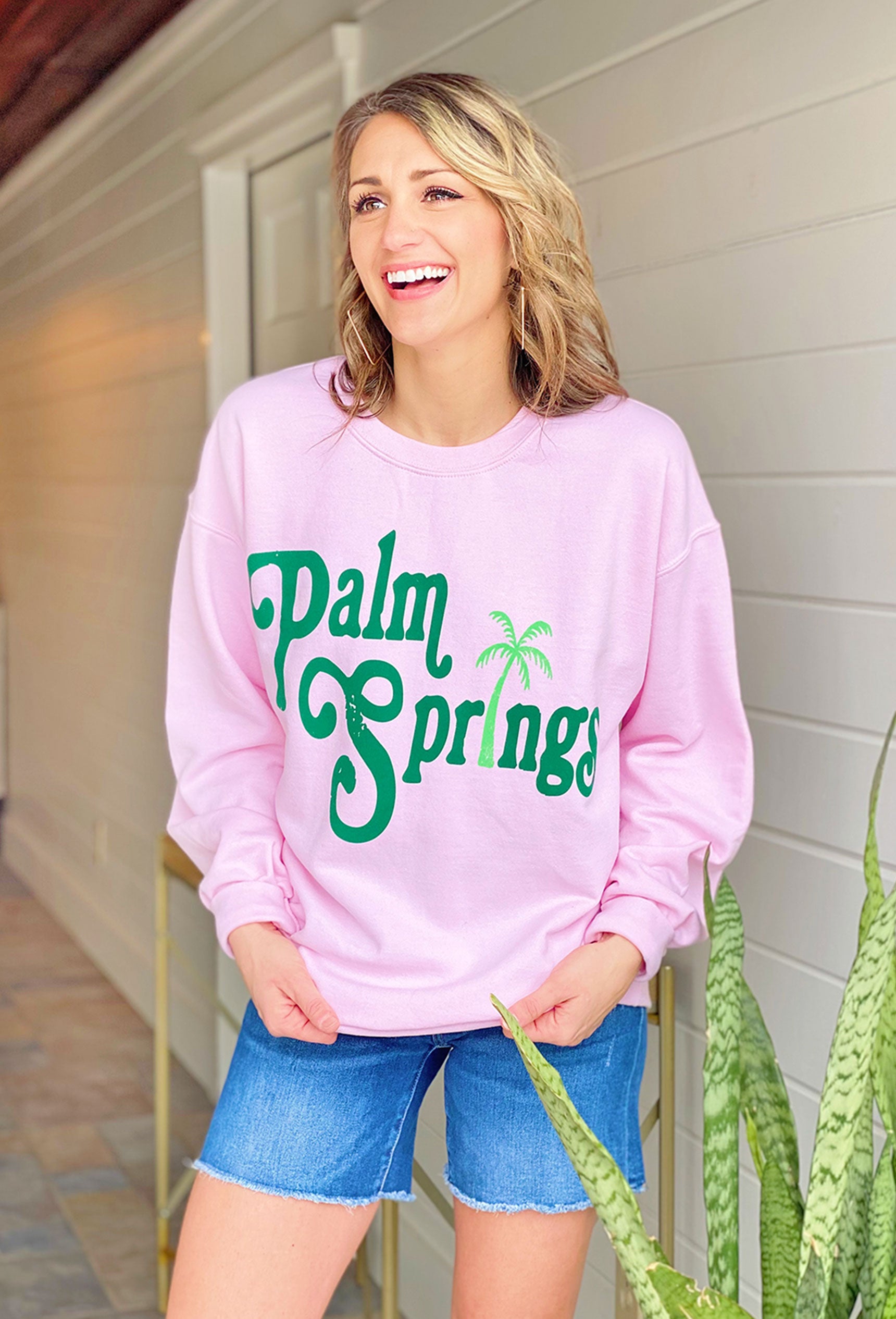 Palm Springs Graphic Pullover, pink sweatshirt with green  "Palm Springs" printed on front