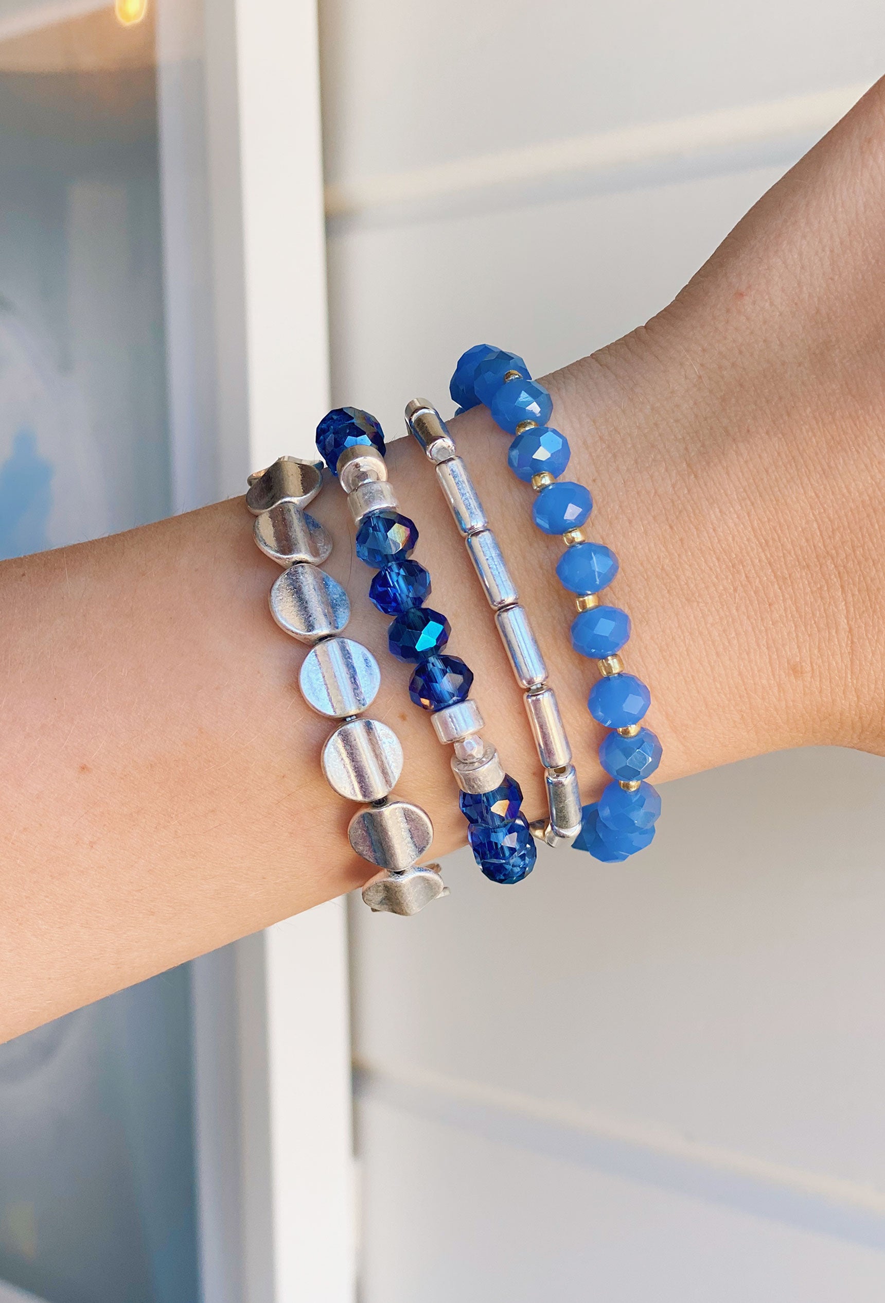 Sunstone Bracelet Set in Blue, set of 4 bracelets, pull on styling, blue and silver beads 