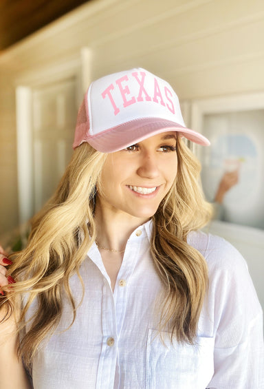 Texas Trucker Hat in light Pink, two toned hat, pink mesh and bill, pink "Texas" written on front, adjustable strap
