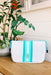 The Shannon Neoprene Large Cosmetic, white neoprene cosmetic bag with silver and blue stripes down the front 