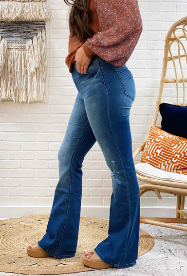 Unpublished Janet High Rise Flare Jeans in Western, high rise medium wash flare jeans with slight distressing at the knee 