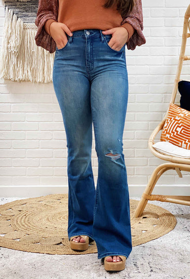 Unpublished Janet High Rise Flare Jeans in Western, high rise medium wash flare jeans with slight distressing at the knee 