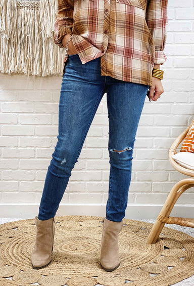 Unpublished Kora Mid Rise Skinny Jeans in Ride, medium wash skinny jean with slight distressing 