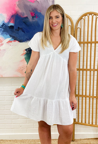 Vacation Mode Linen Dress, babydoll style body, v-neck with a tiered bottom, white linen material