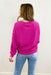 Z SUPPLY Vintage Statement Sweatshirt in Fiesta Fuchsia, pullover with embroidered wording on the sleeve, embroidered flower detailing on the opposite sleeve
